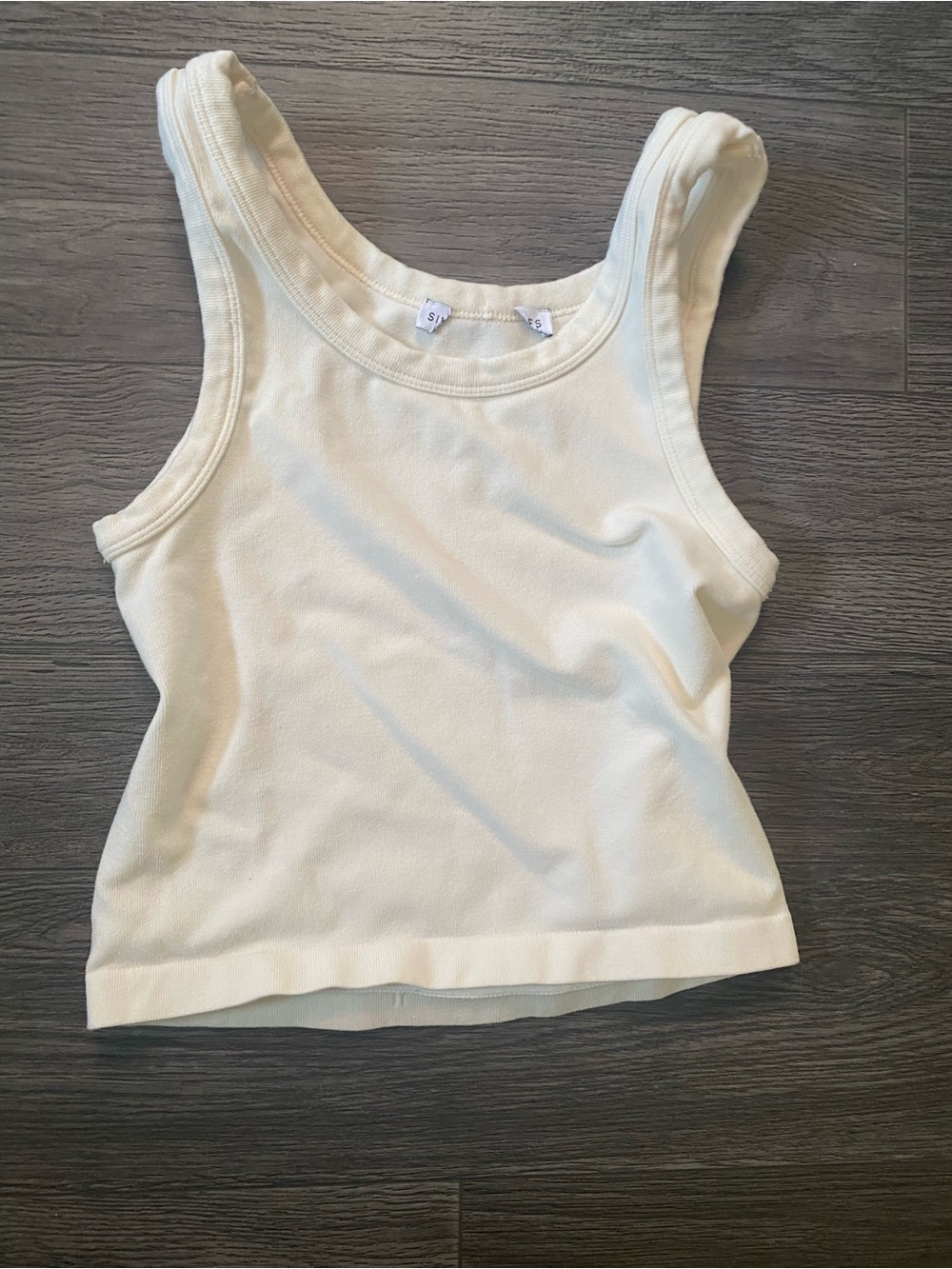 Women’s Cream Tank Top tag ripped